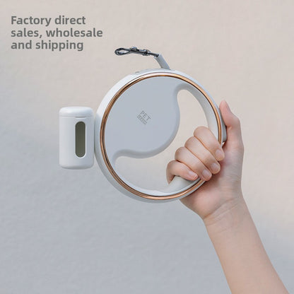 Hand holding a pet leash and collar set with a plain background